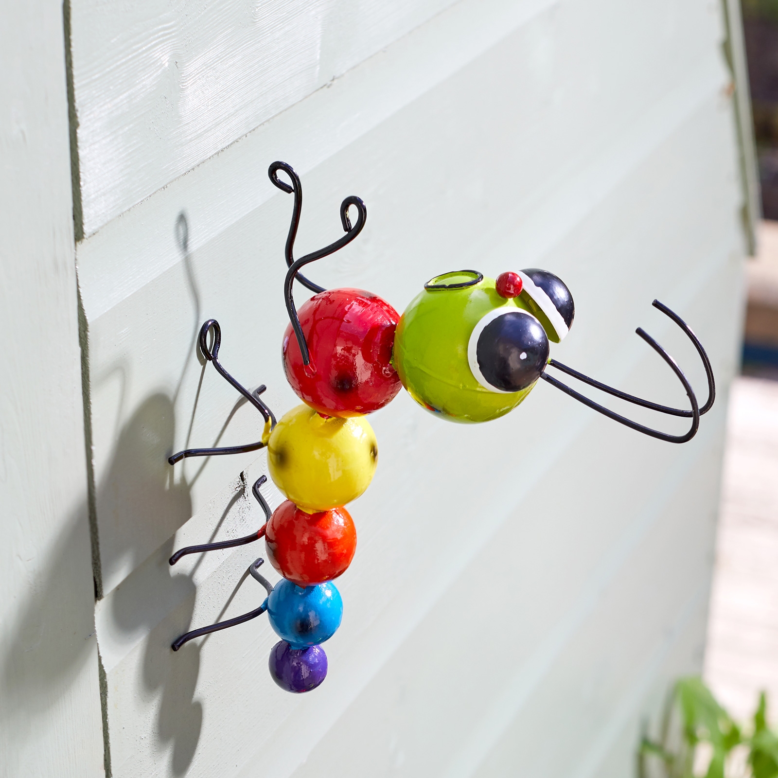 Click to view product details and reviews for Crazy Caterpillar Garden Decoration Hangers On.