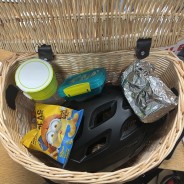 Trout & Picnic Creel Basket 4 Holding large cycle helmet, large water bottle, and lunch