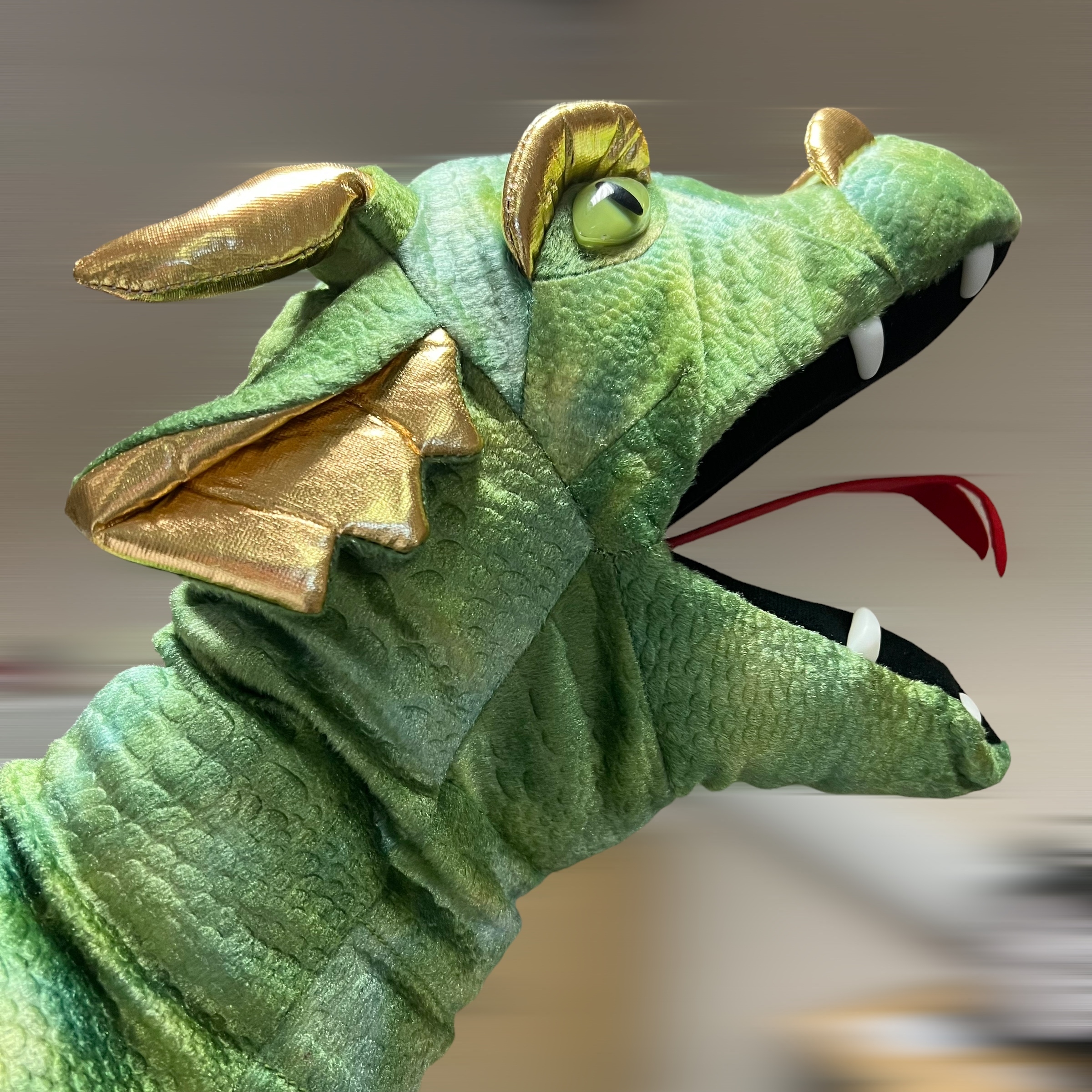 Click to view product details and reviews for Large Dragon Head Hand Puppet In Green And Gold.