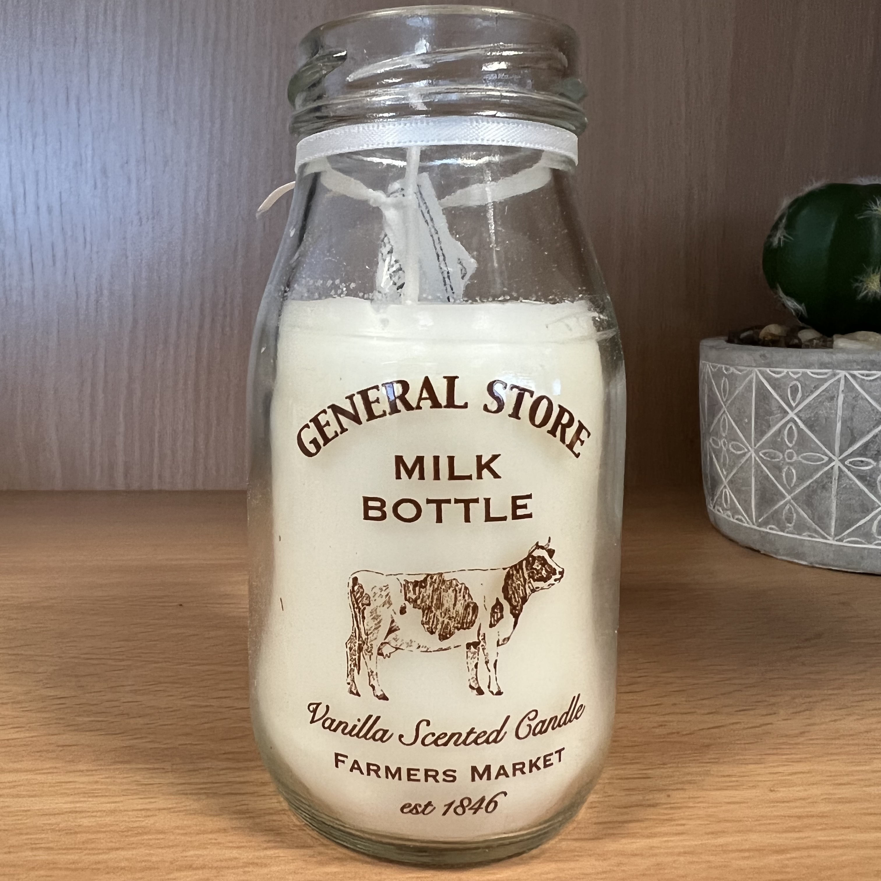 Click to view product details and reviews for Milk Bottle Candle Vanilla Scented.