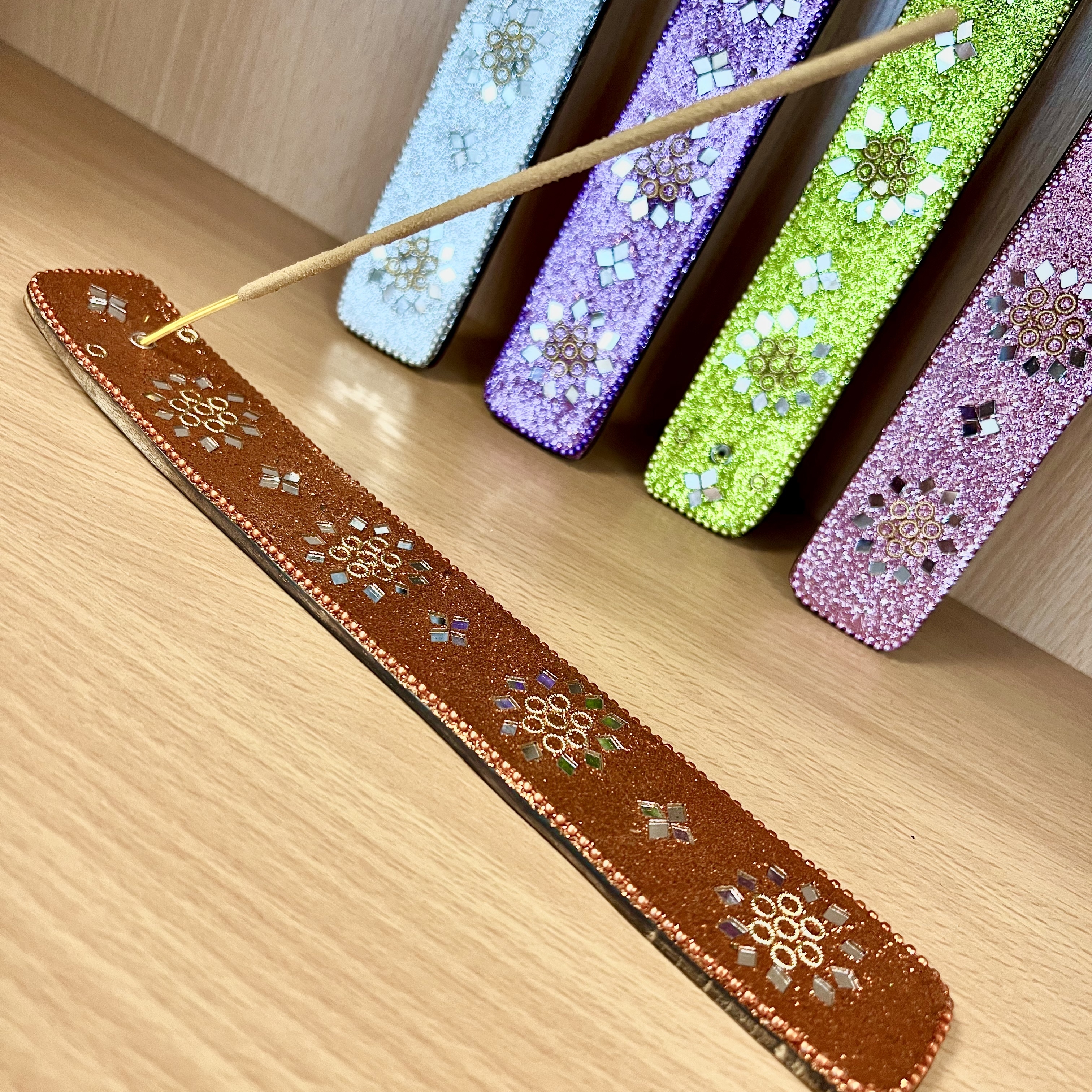 Click to view product details and reviews for Mirror And Glitter Incense Stick Holder By Namaste.