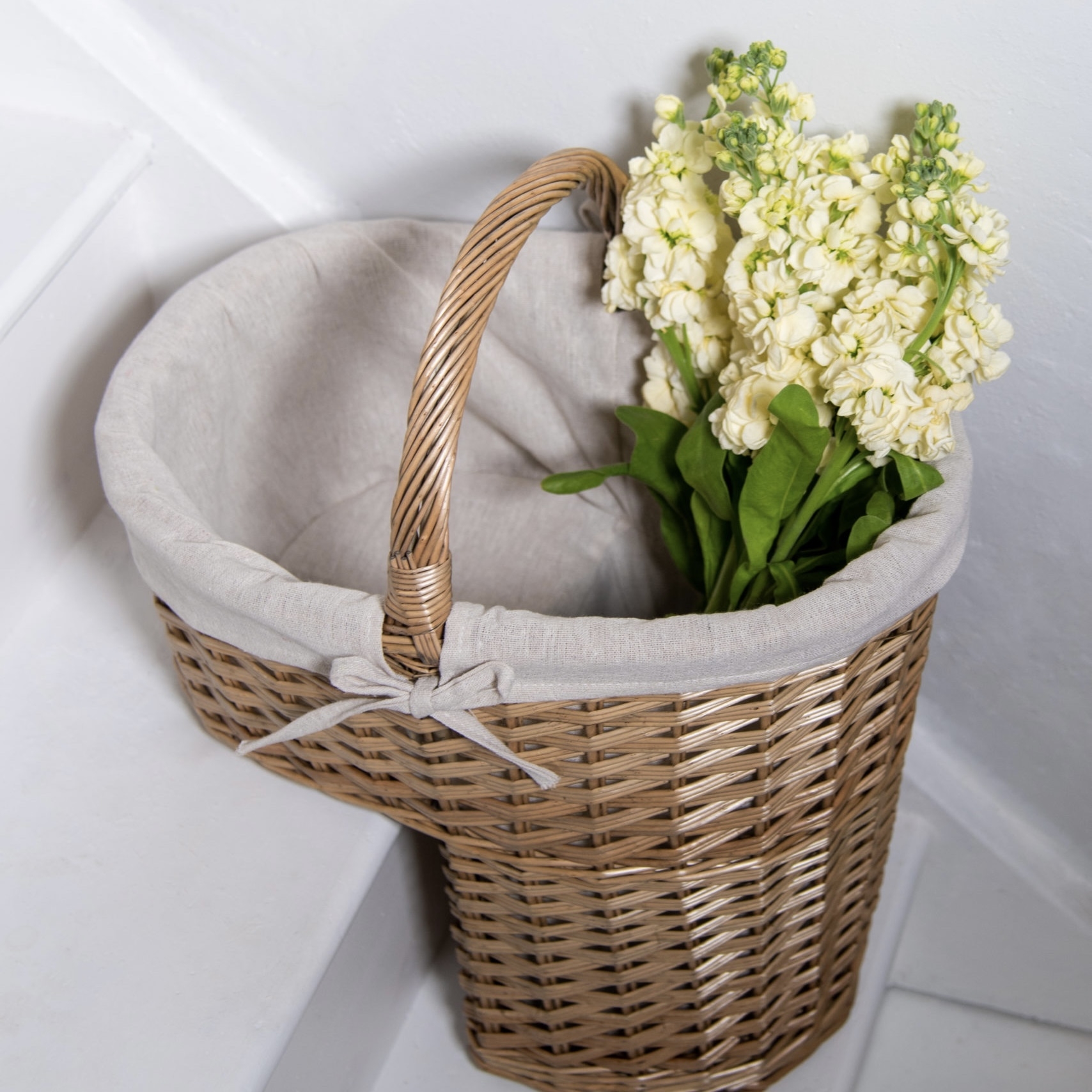 Click to view product details and reviews for Triple Weave Willow Stair Basket With Cotton Lining.