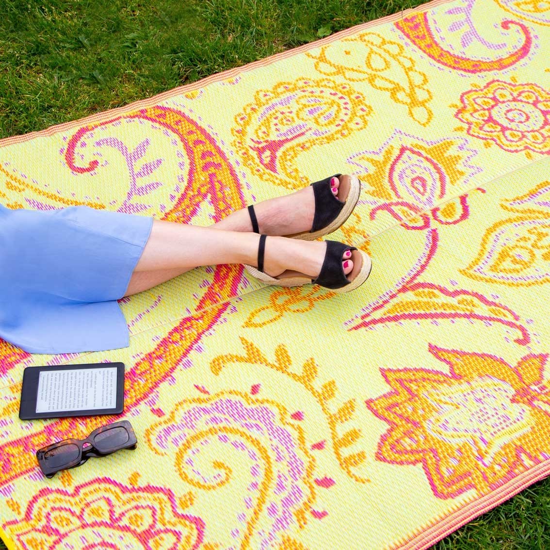 Click to view product details and reviews for Paisley Outdoor Rug With Pink And Yellow Reversible Design.
