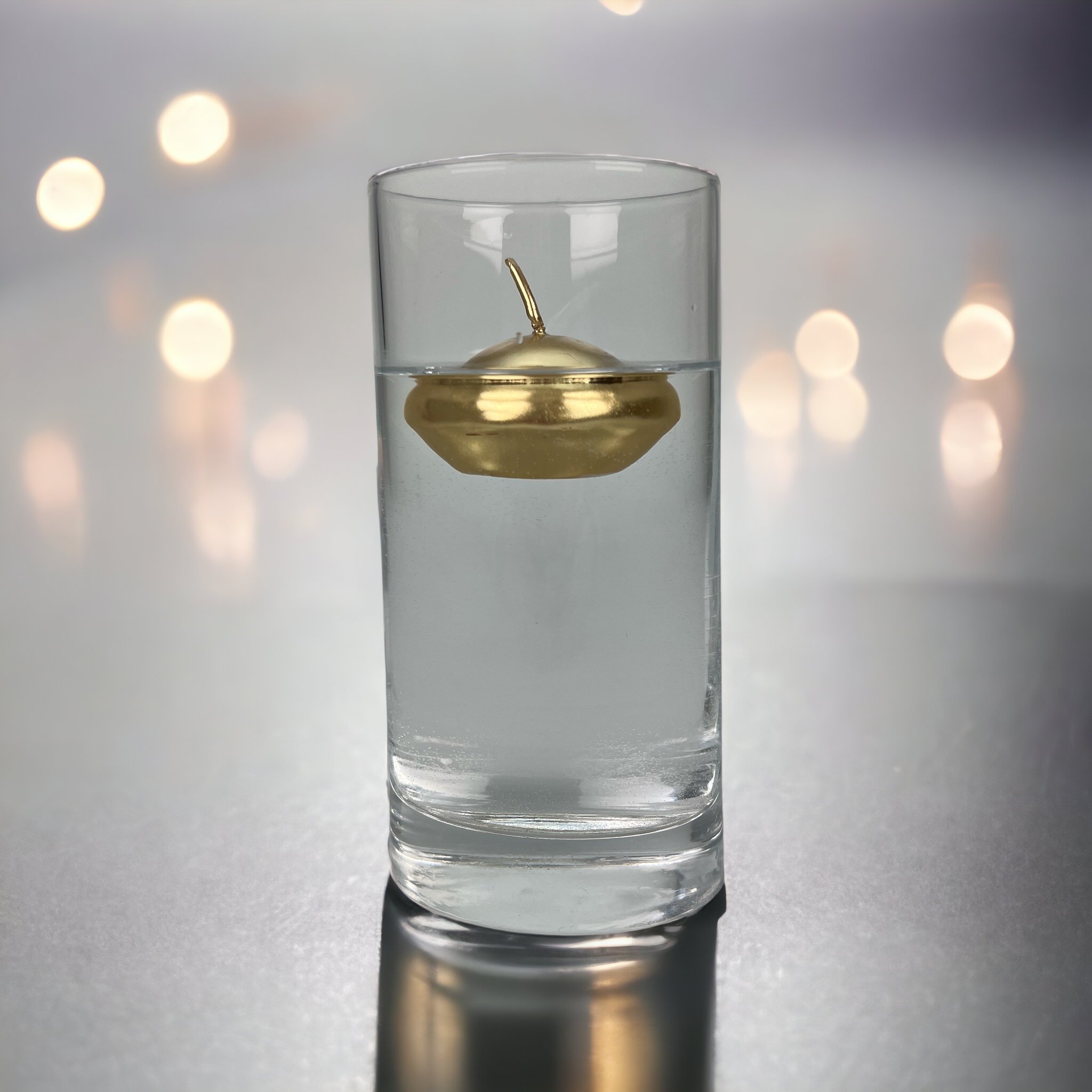 Click to view product details and reviews for Gold Floating Candles 6 Pack.