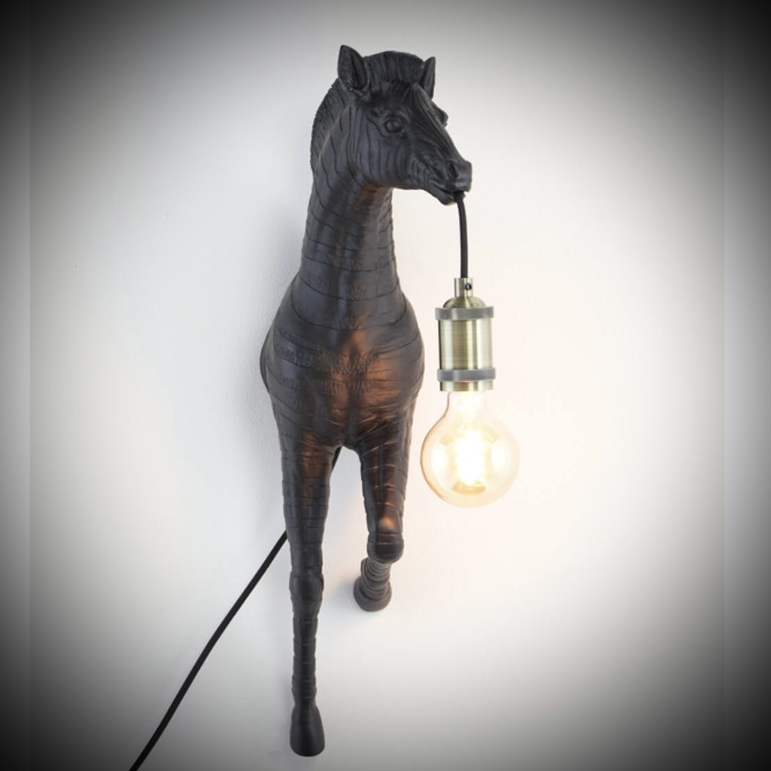 Click to view product details and reviews for Running Zebra Wall Lamp Matt Black 60cm 3124412.