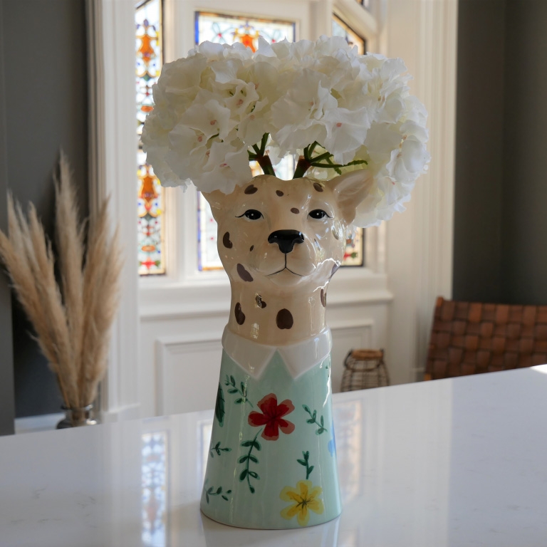 Click to view product details and reviews for Large Leopard Head Vase.