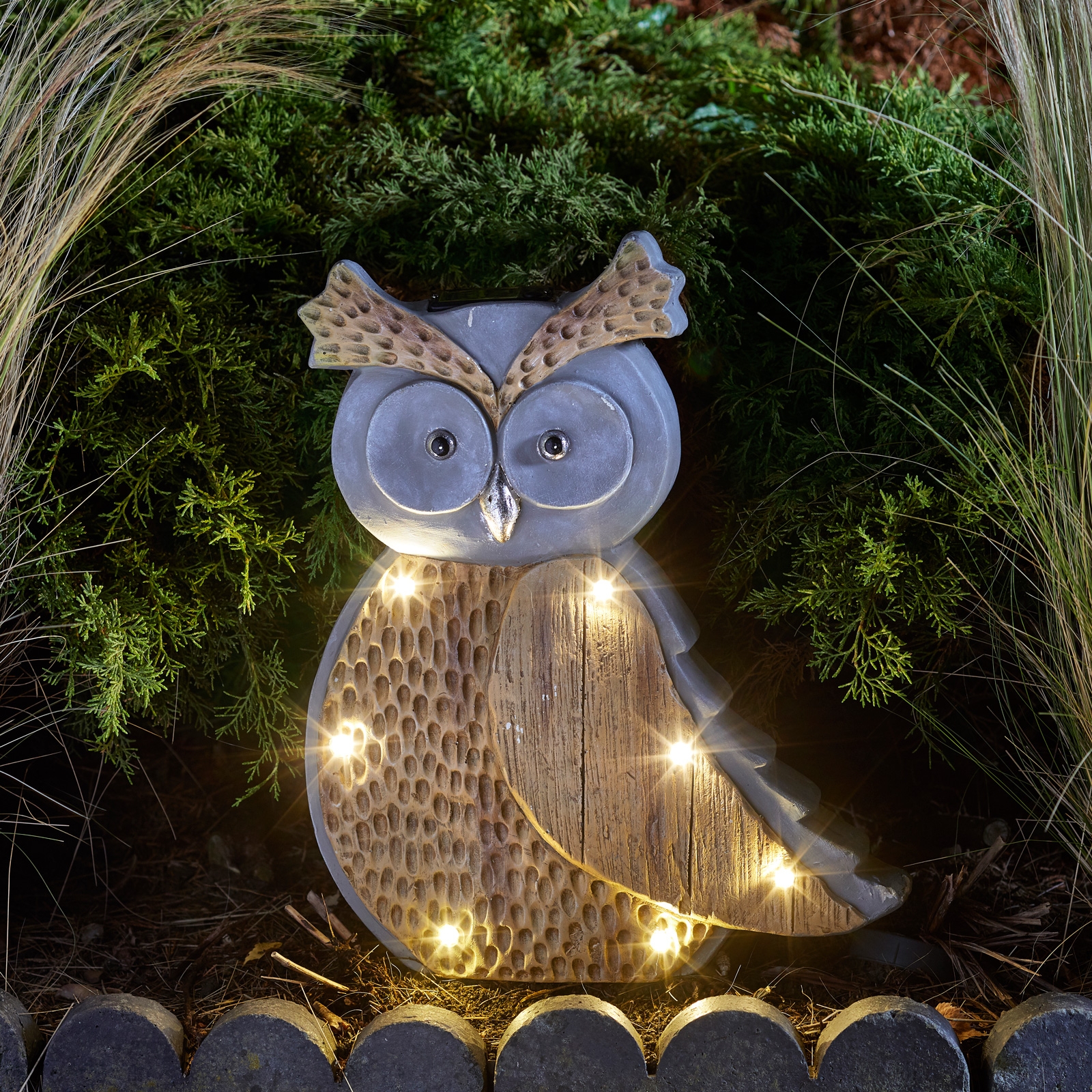 Click to view product details and reviews for Solar Woodstone Inlit Owl.