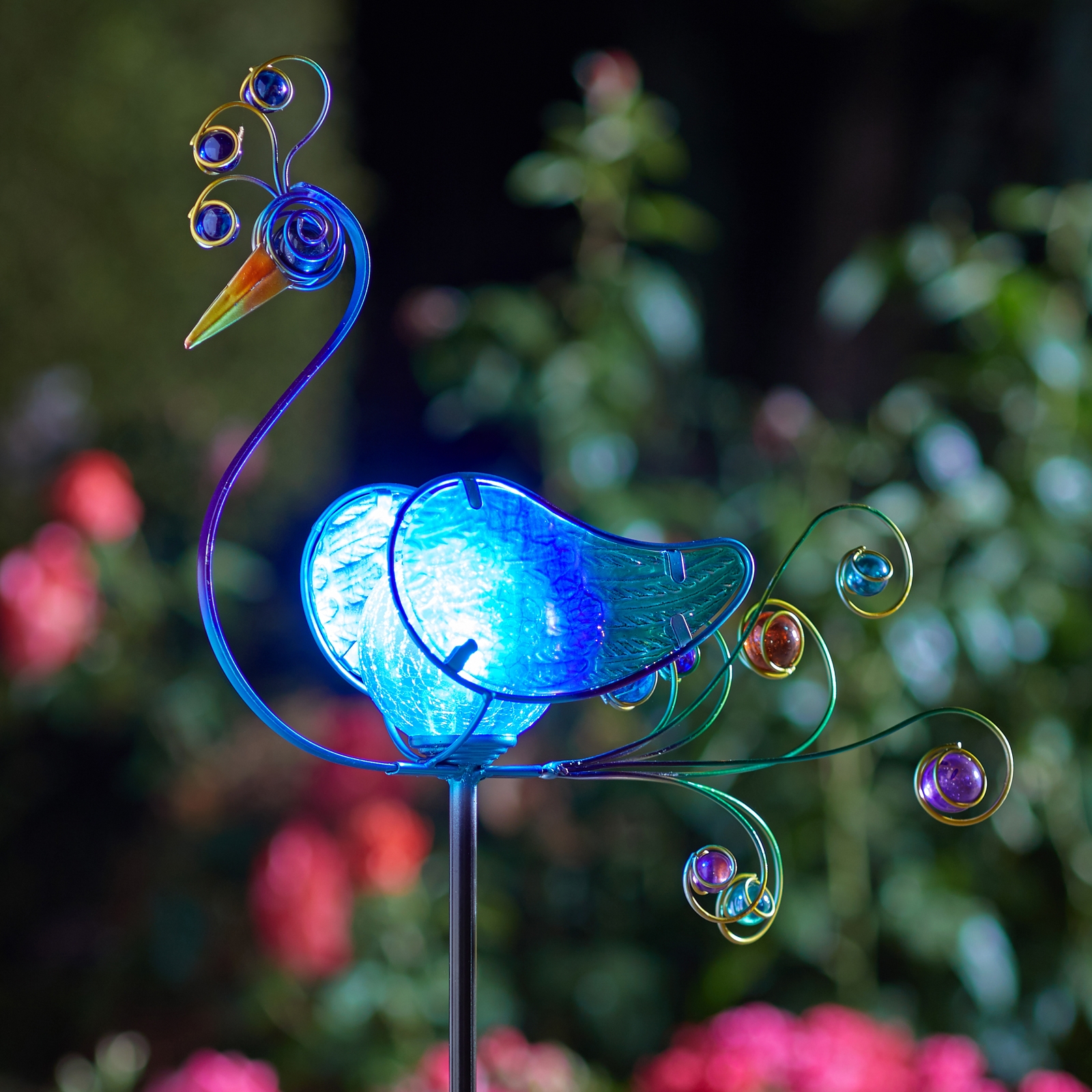 Click to view product details and reviews for Solar Peacock Stake Light.