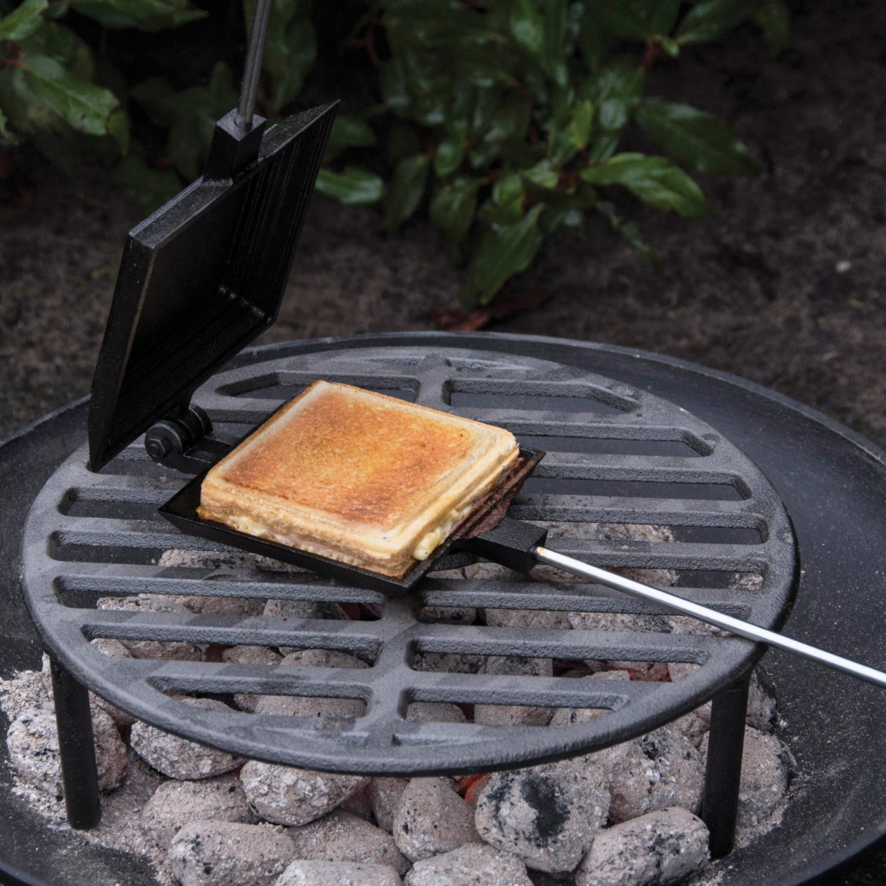Click to view product details and reviews for Toasting Iron In Heavy Duty Cast Iron.