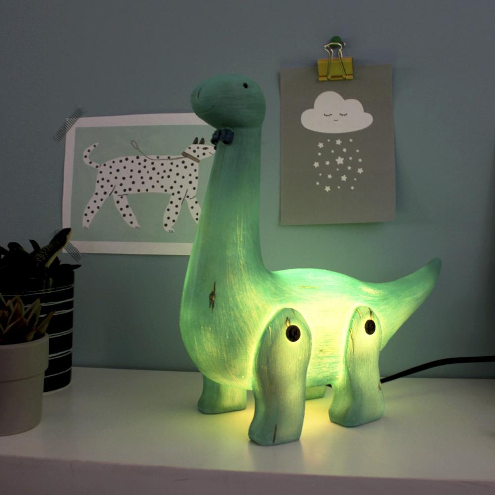 Click to view product details and reviews for Wood Effect Diplodocus Lamp.